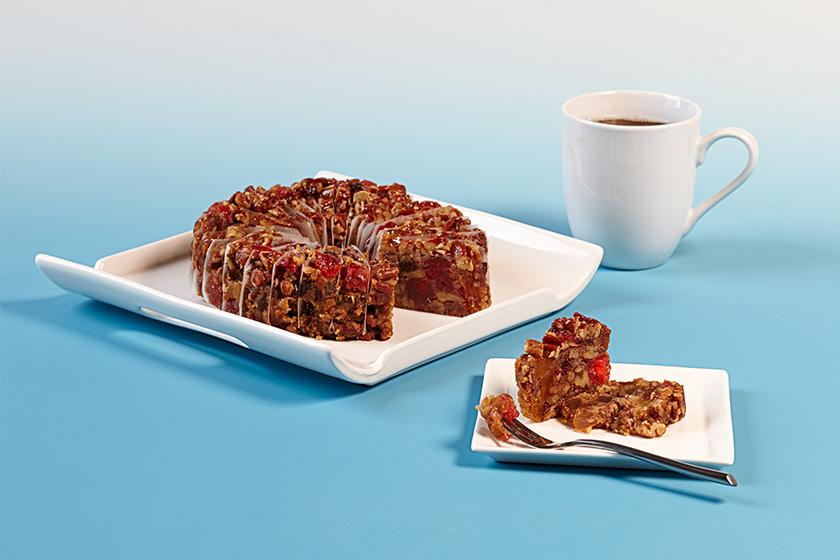 Sliced Gluten-Free Fruitcake with Coffee Cup